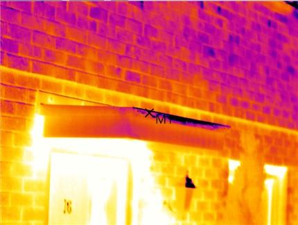 Thermal image &mdash; Lintel cold bridge. Heat tracking along an uninsulated lintel above a doorway &mdash; invisible on a visual inspection, unmistakable in infrared.